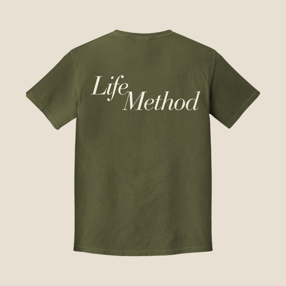 Back of the Life Method Army Green tee with a large cream Life Method script across the upper back