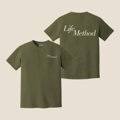 Life Method Color of the Month tee in Army Green, front and back with cream Life Method script logo