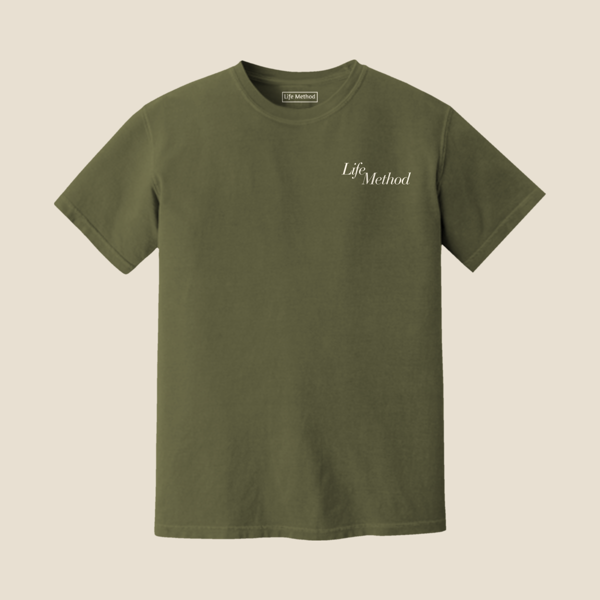 Front of the Life Method Army Green tee with a small cream Life Method script on the left chest